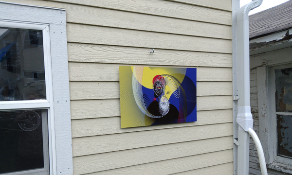 Chromaluxe aluminum
print hanging on outside wall